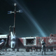A base on a planet in Star Citizen with a red giant in the background